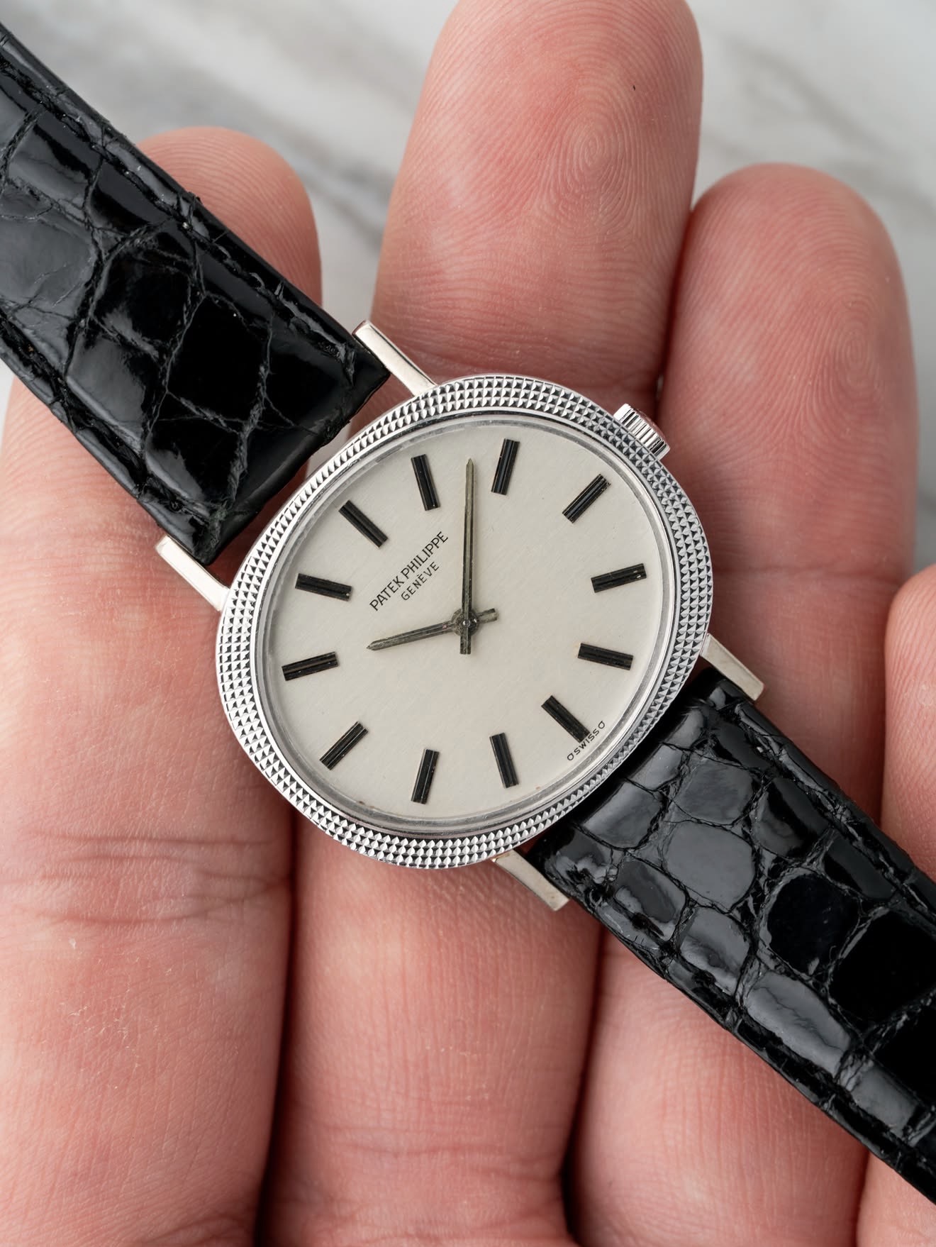 Patek Philippe Calatrava with hobnail bezel on black alligator strap
